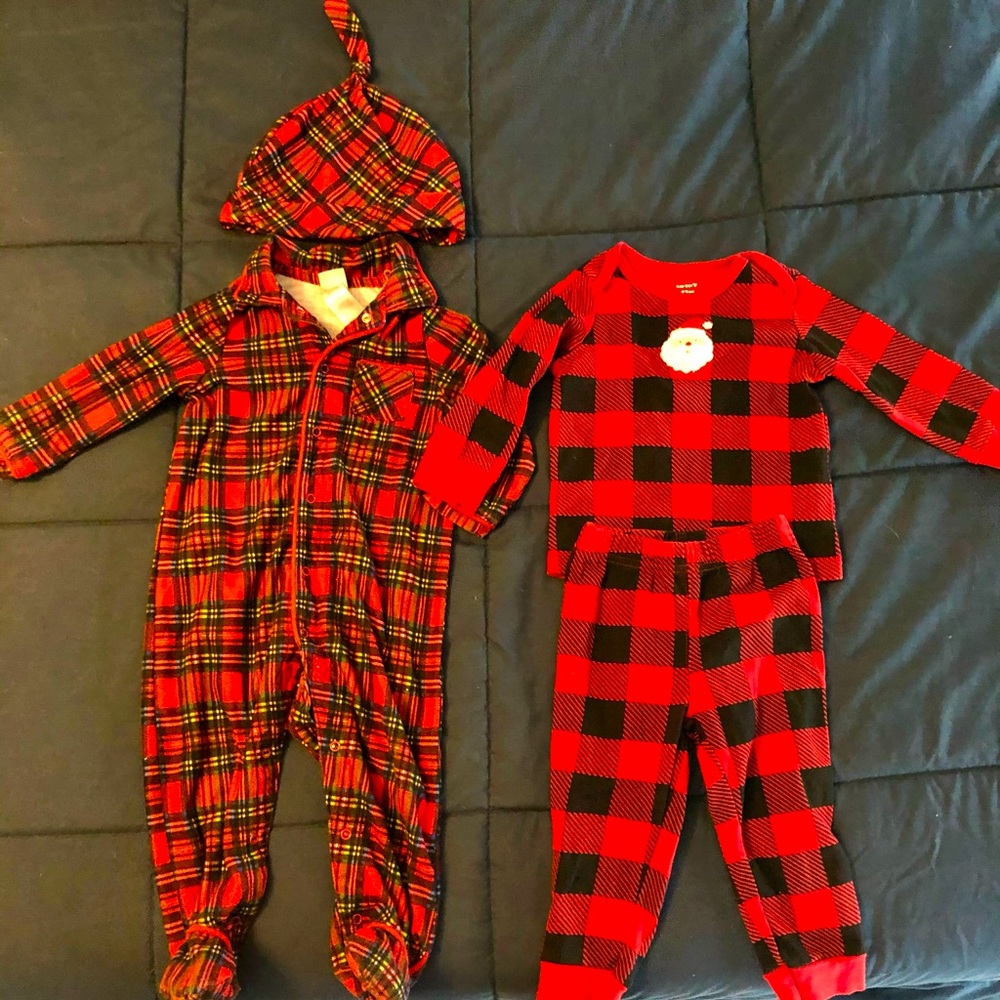 Like- new two Christmas pajama sets. Size 12 m